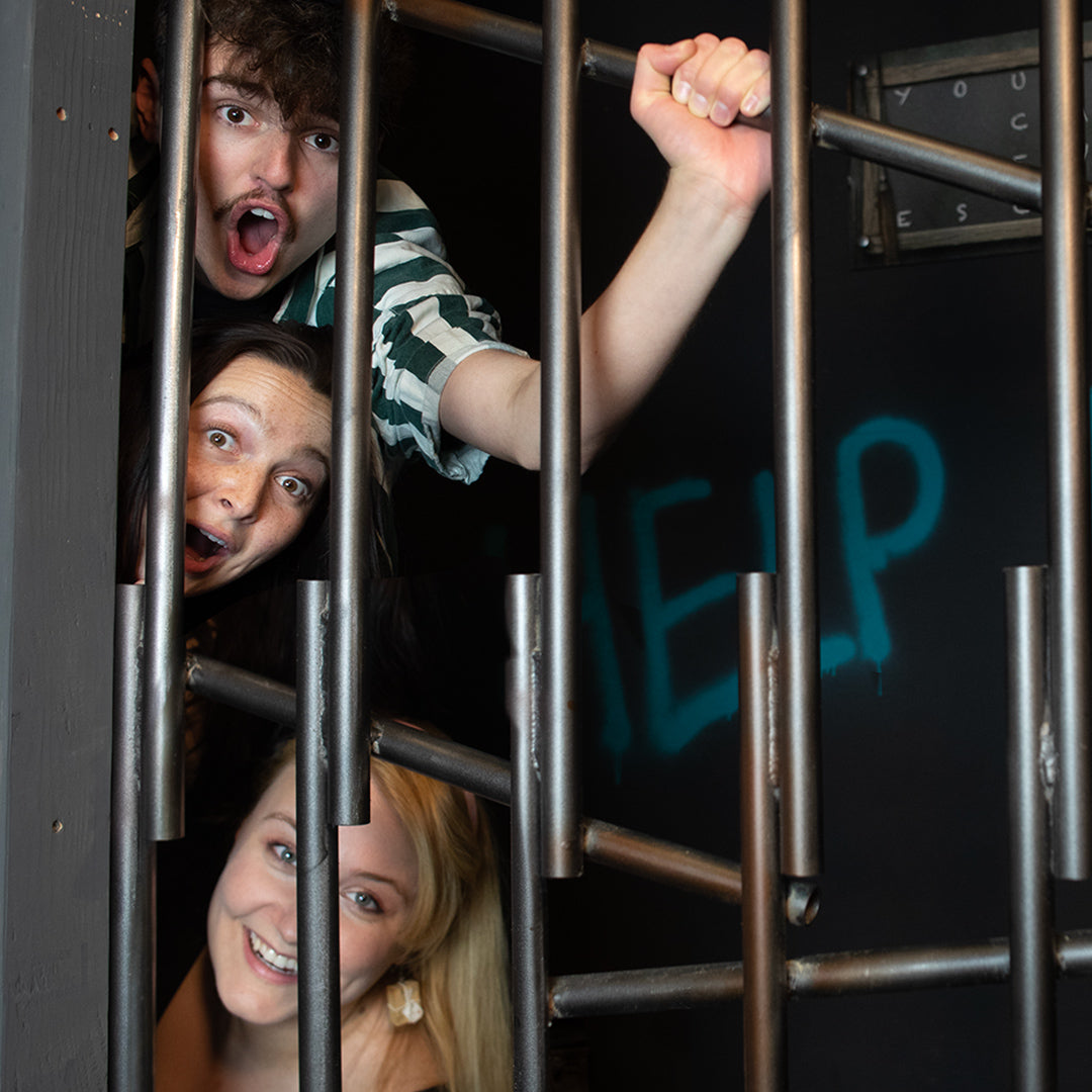 3 people trapped in a cell